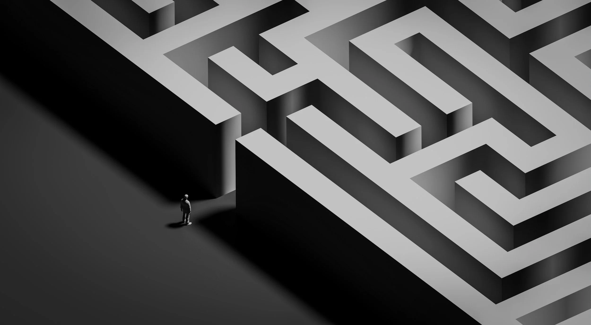 Aerial view of a large black-and-white maze, representing the complexity of furniture shopping
